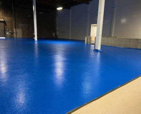 Finished epoxy urethane commercial food processing facility flooring system