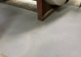 Commercial flooring system low areas of concrete after repair