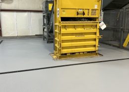 Beverage plant flooring installation around industrial equipment