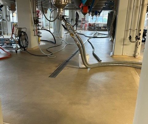 Epoxy brewery floors 10 years after original commercial install in Colorado