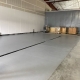 Epoxy flooring installation at Grains of Wrath Brewery with center drain