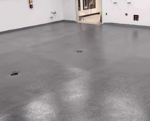 Finished epoxy urethane commercial flooring with slope in Oakland California