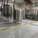 Epoxy flooring installation in Fredericksburg Texas Brewery