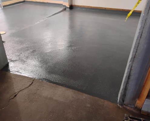 Epoxy flooring installation in Astoria Oregon kitchen